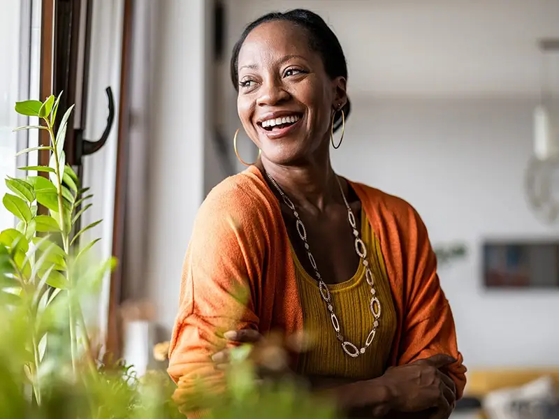 Woman smiling looking over to her right